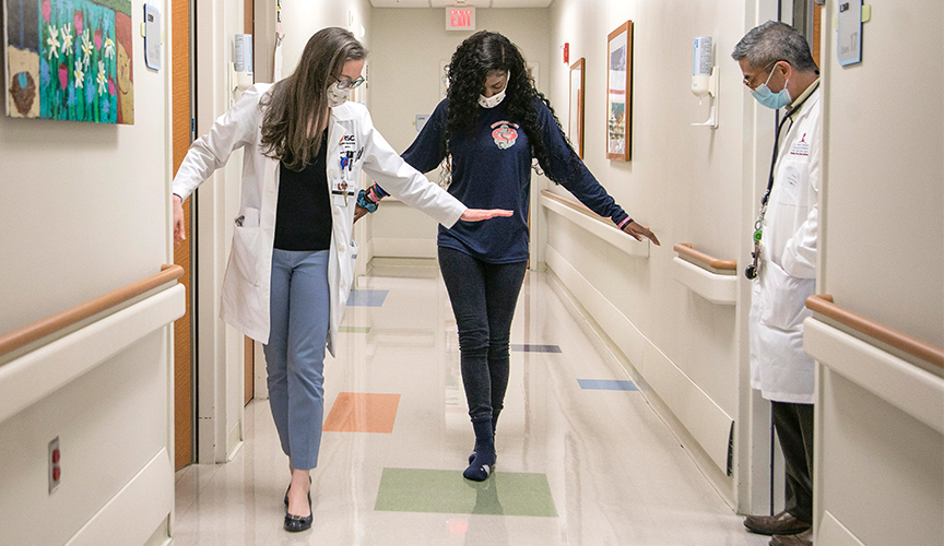 Dr. Beth Anne Cavanaugh examines a patient in Pediatric Stroke Clinic.